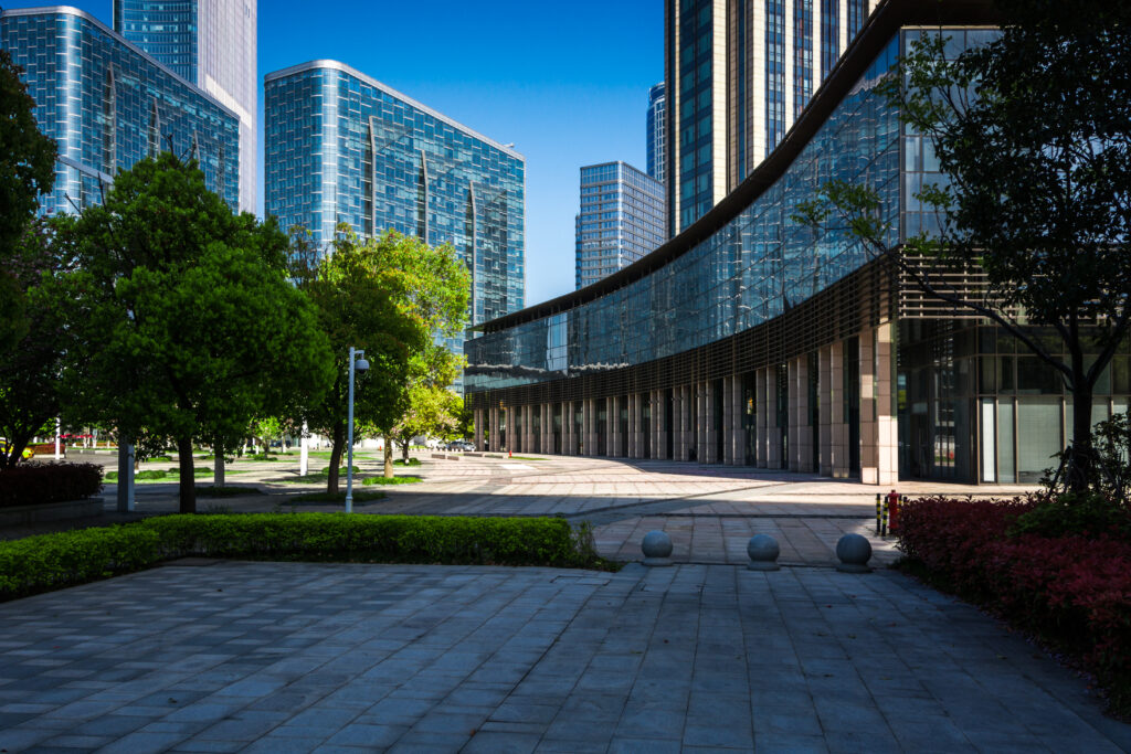 Conseil immobilier - Etudes de marché - immeubles modernes et arbres - Wüest Partner